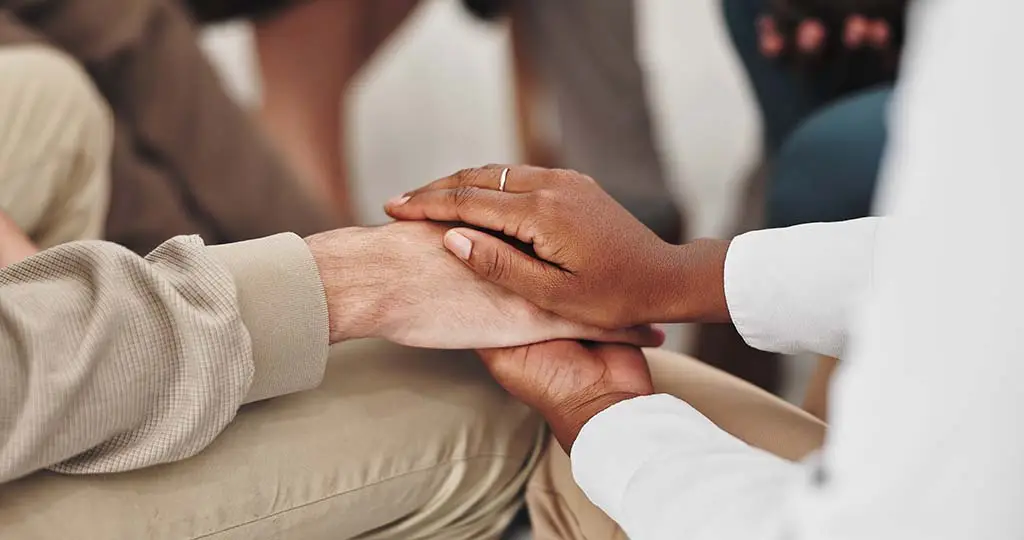 A group supporting each other in a session.